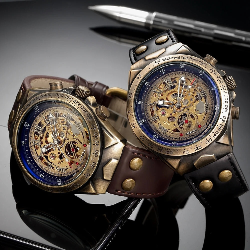 Detailed view of a men's gold automatic timepiece, skeleton dial, and textured black leather band