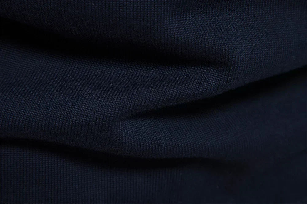 Essential men's half-zip striped knit pullover, perfect for layering in fall and winter fashion.