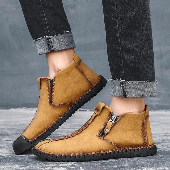 Brown leather men's ankle boots, hand-stitched for durability and a casual look