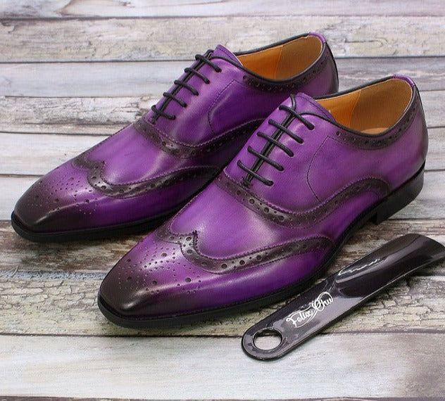 Professional men's leather Oxford shoes, featuring a timeless wingtip brogue design for sophisticated business style.