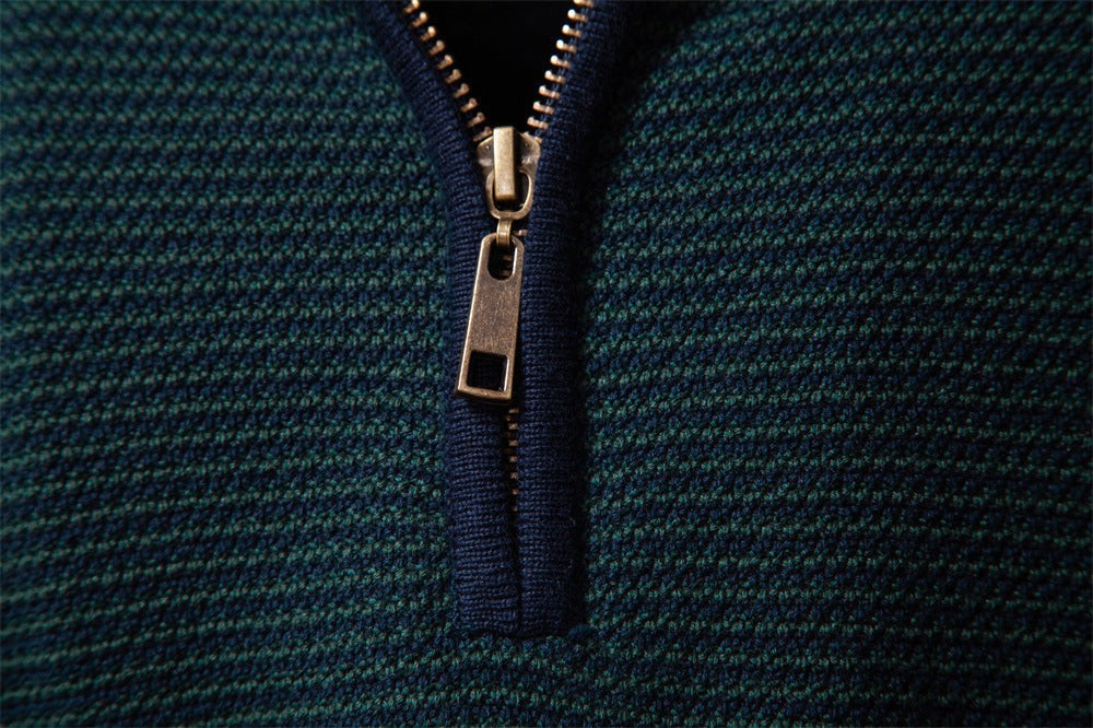 Lifestyle shot of man wearing a modern half-zip cotton blend sweater, autumn layering