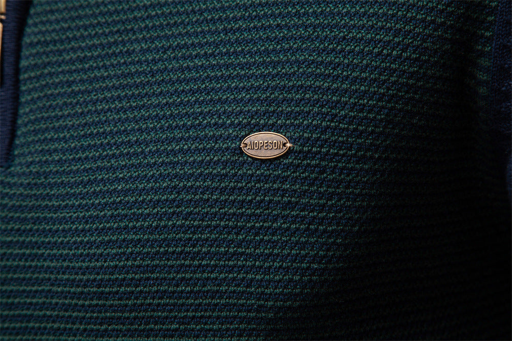 Angled view of men's maroon half-zip sweater, durable cotton blend knit for men