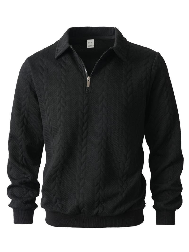 Stylish man wearing a black half-zip knit pullover sweater with a collared shirt for a layered look.
