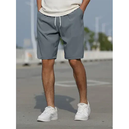 Men's high rise relaxed fit summer shorts in a light fabric, perfect for casual warm weather comfort.