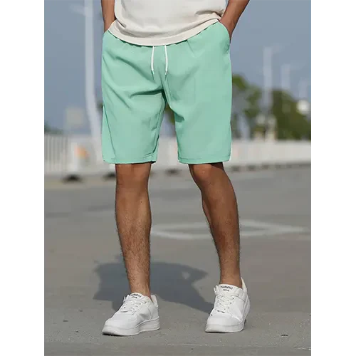 Versatile men's summer shorts with a relaxed high rise fit, perfect for warm weather activities and daily style.