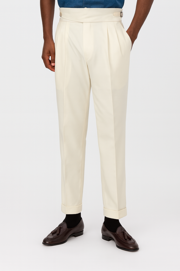 Men's high-waisted pleated trousers in a refined style, perfect for formal or smart casual events. Tailored fit.