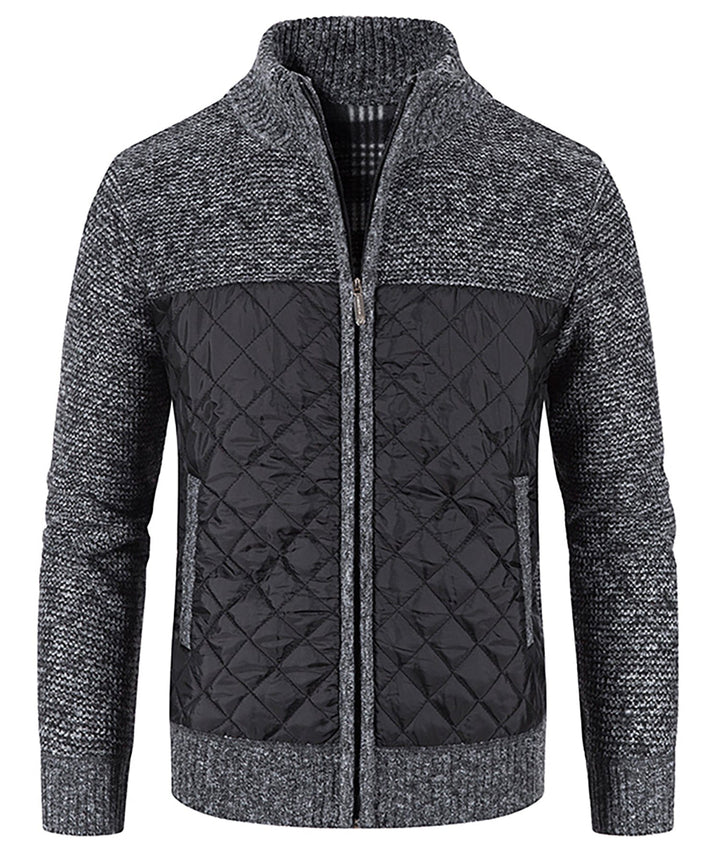 Detail shot of the zipper on a Men's Hybrid Quilted Sweater Jacket, a durable and practical design element