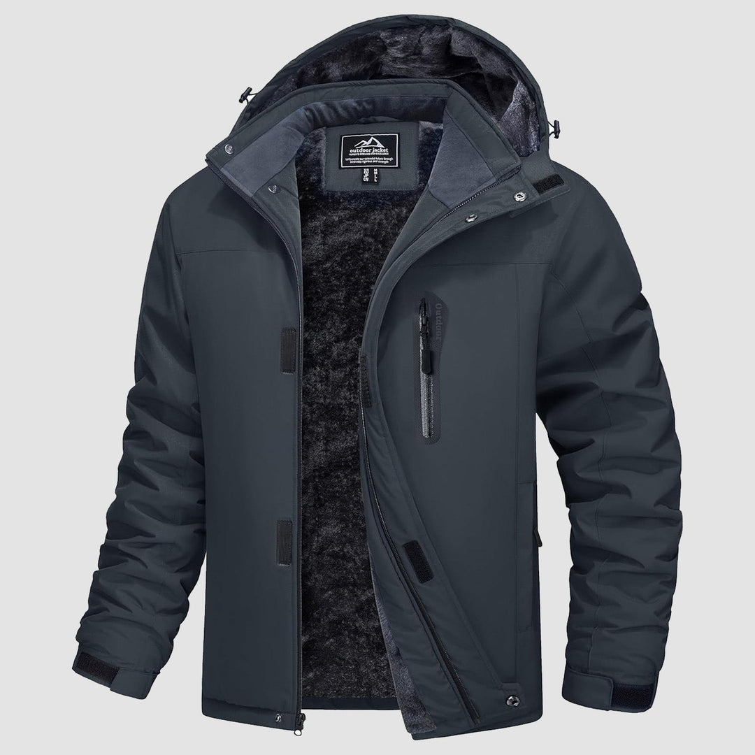 Close-up of men's water-resistant alpine jacket fabric, showing insulated texture for warmth.