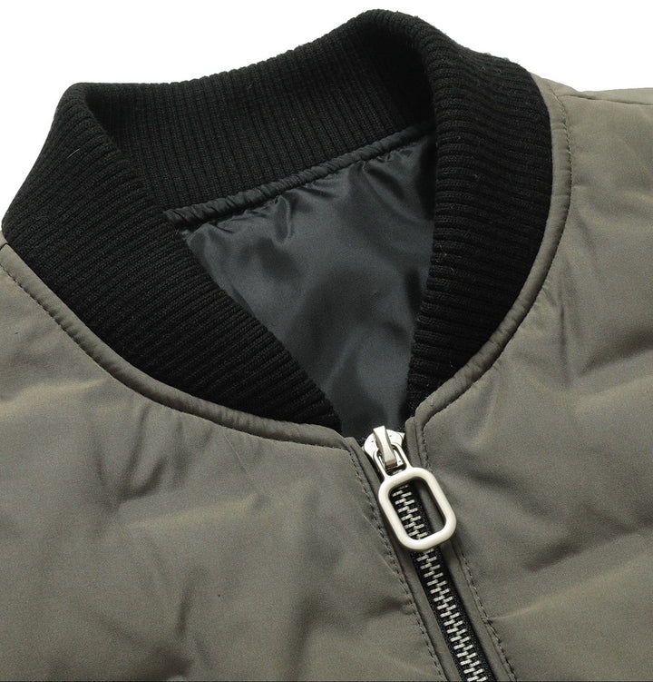 Side profile of a men's insulated bomber jacket, highlighting its fit and casual outerwear look.