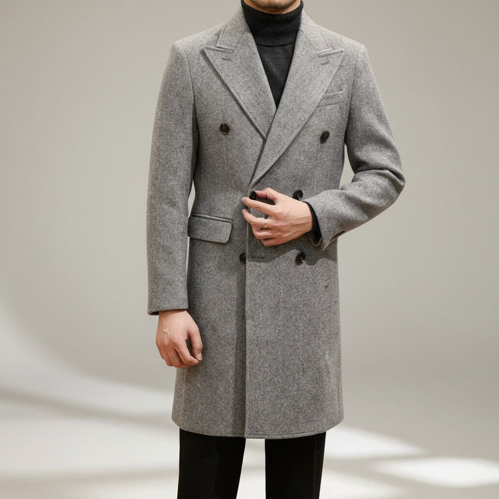 Men's Italian-style grey double-breasted overcoat for elegant winter formal wear. Tailored men's fashion outerwear.