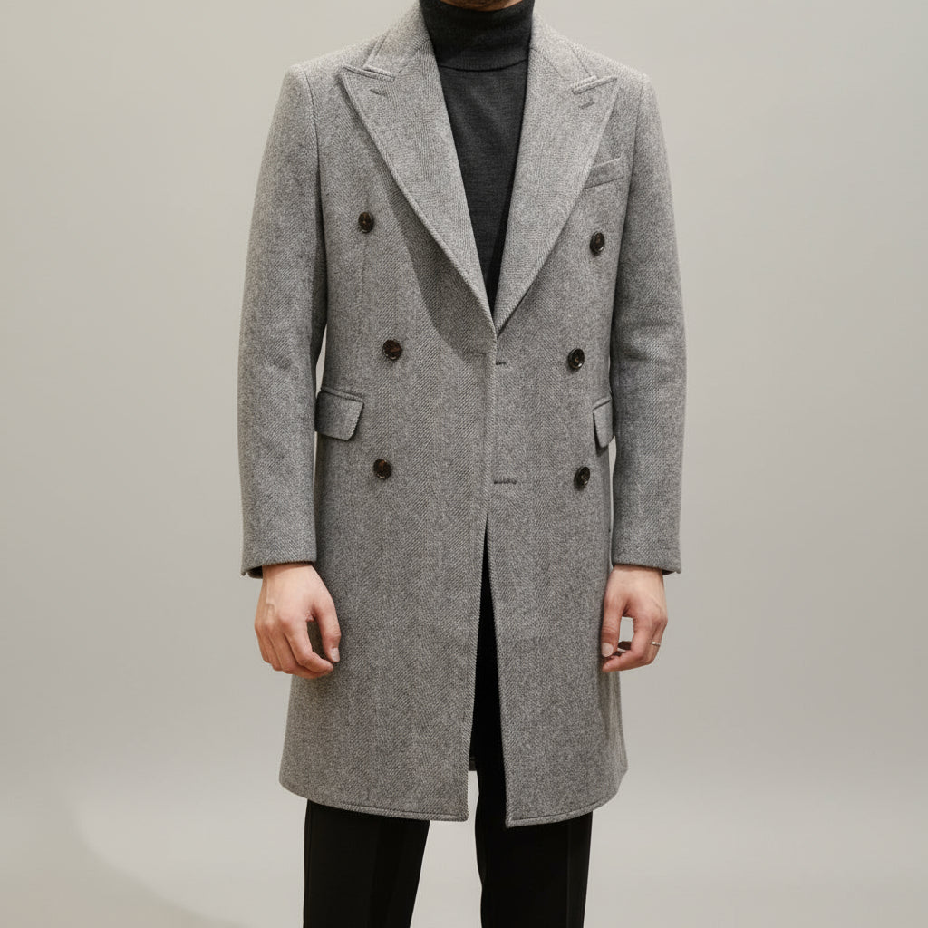 Stylish men's grey double-breasted overcoat. Italian-style tailored winter coat, ideal for formal and elegant wear.