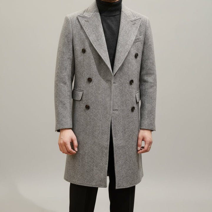 Stylish men's grey double-breasted overcoat. Italian-style tailored winter coat, ideal for formal and elegant wear.