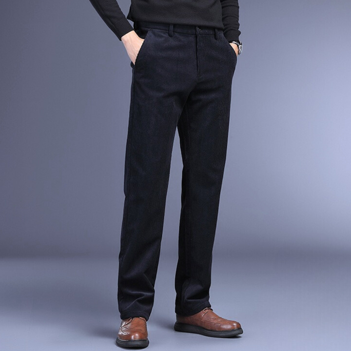 Black corduroy men's pants, back view, highlighting the soft texture and stretch comfort.