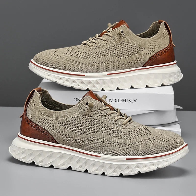Close-up of men's knit sneakers featuring classic brogue detailing, combining style and comfort.
