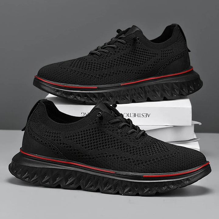 Comfortable men's knit footwear, designed as brogue dress sneakers for versatile styling.