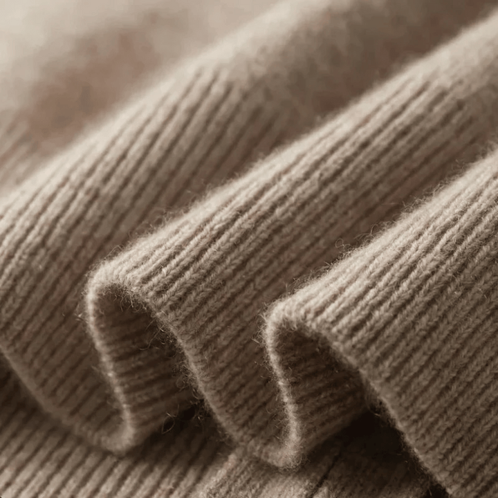 Full view of a men's knit zip-up cardigan. Long-sleeve, collared design for stylish layering.