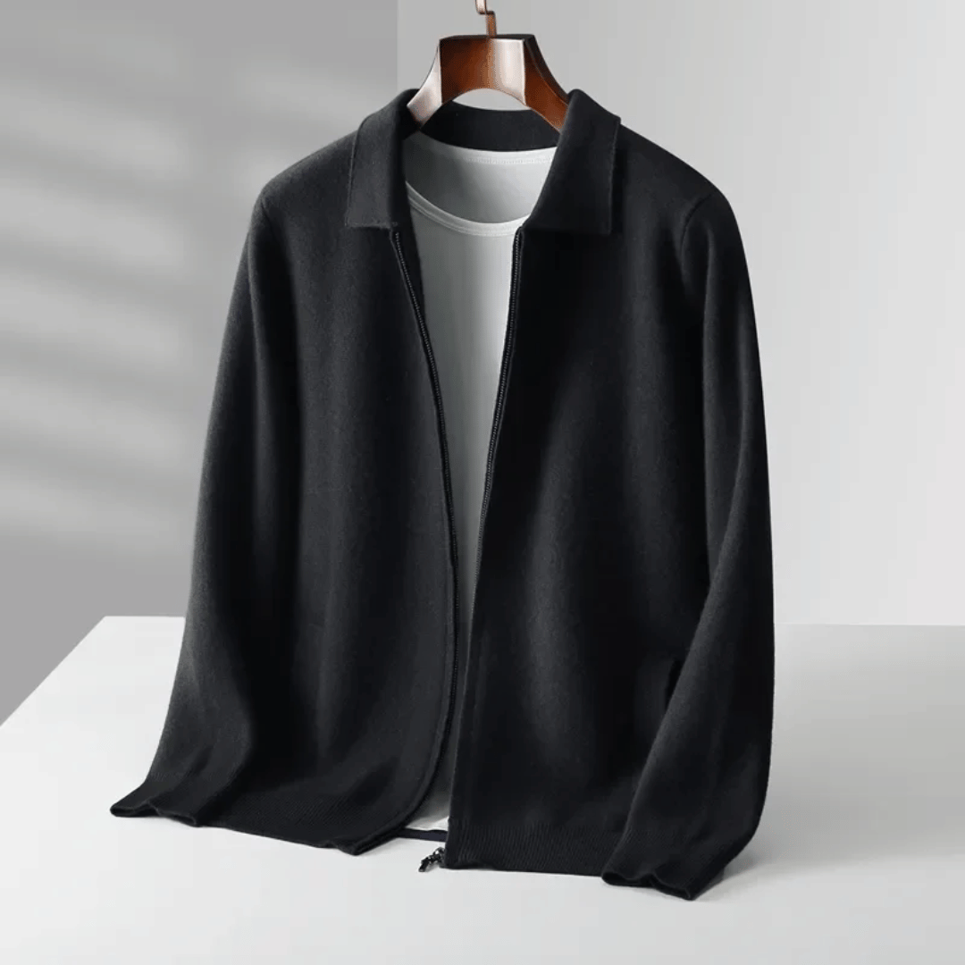Model wearing a stylish men's knit zip-up cardigan. Collared, long-sleeve for a refined casual look.
