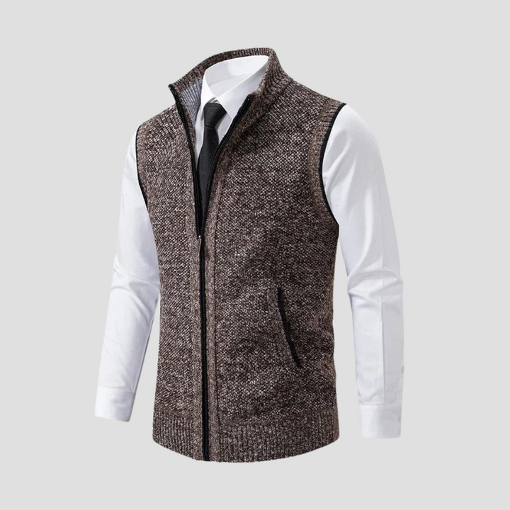 Man in a versatile men's knitted zip gilet walking outdoors, perfect smart casual outerwear for a layered look.