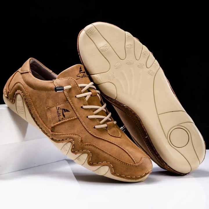 Stylish men's lace-up casual footwear, versatile low-top walking sneakers.