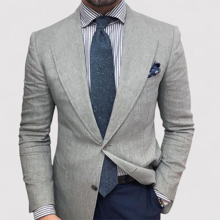 Men's light gray slim fit blazer, tailored for a smart casual or business look. Versatile and stylish men's jacket.