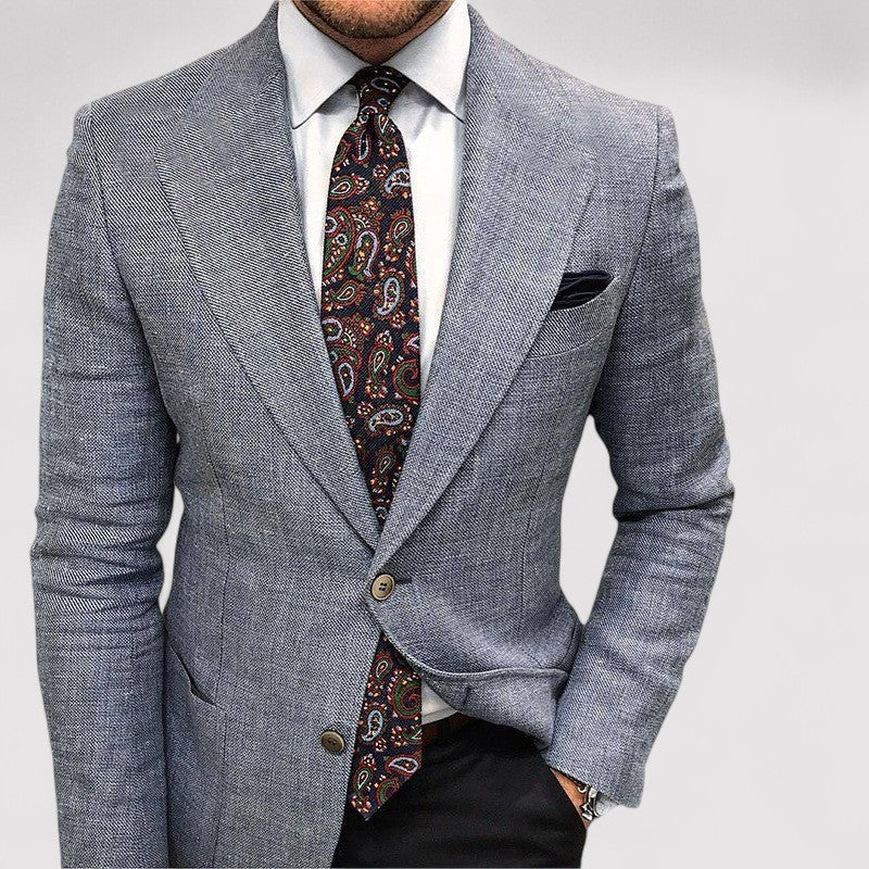 Tailored men's slim fit blazer. This stylish jacket is ideal for smart casual, business, or formal fashion attire.