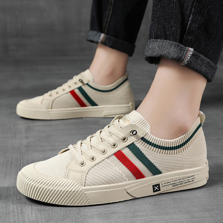 Comfortable men's lightweight sneakers, designed with breathable fabric and secure lace-up for modern daily fashion.
