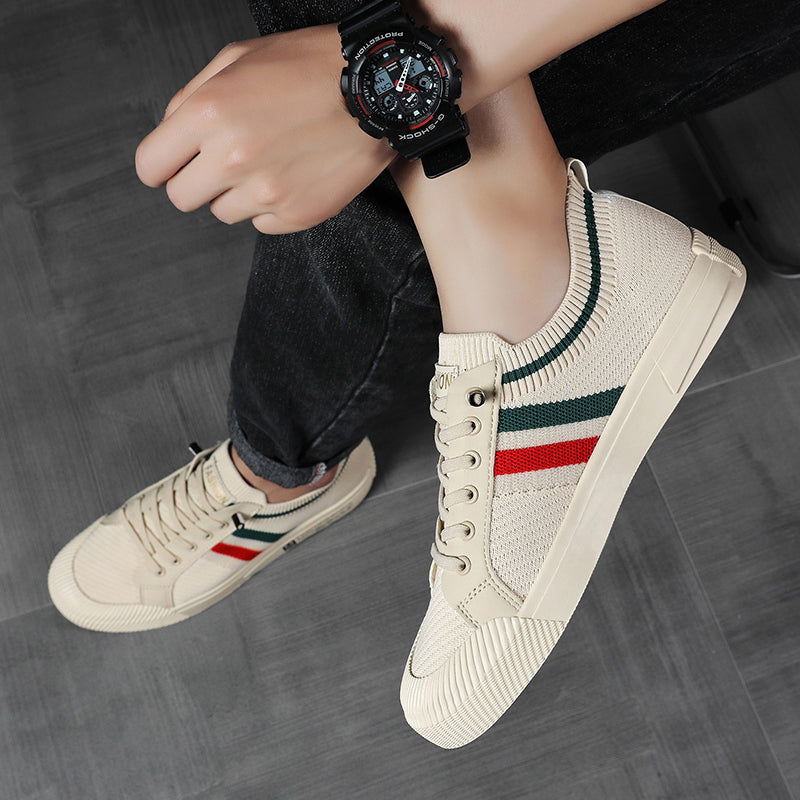 Lightweight men's athletic sneakers with supportive lace-up closure, offering breathable comfort for active daily wear.