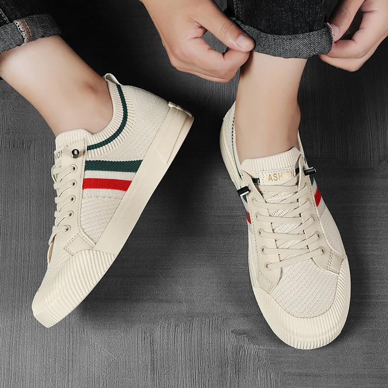Men's comfortable low-top sneakers in a sleek black, featuring breathable knit upper and classic lace-up style.