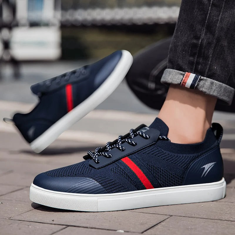 Side profile of men's casual knit sneakers, showing comfortable design for everyday activities