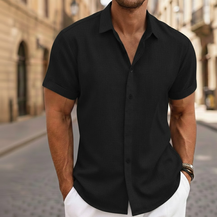Breathable men's lightweight short sleeve polo shirt with button front. Essential for casual summer fashion.