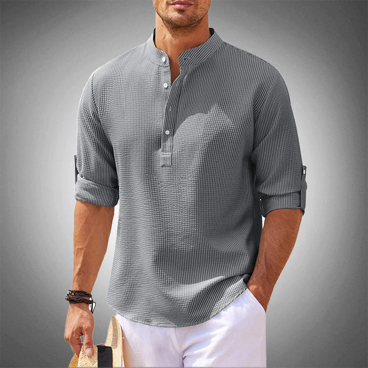 Comfortable men's lightweight summer shirt with short sleeves. Breathable and versatile for casual warm weather fashion.