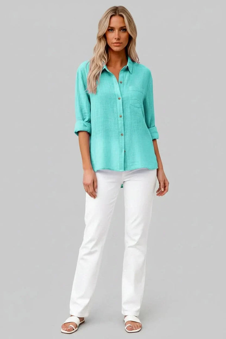 Versatile men's solid button-up top. Lightweight design offers breathable comfort for any casual occasion.