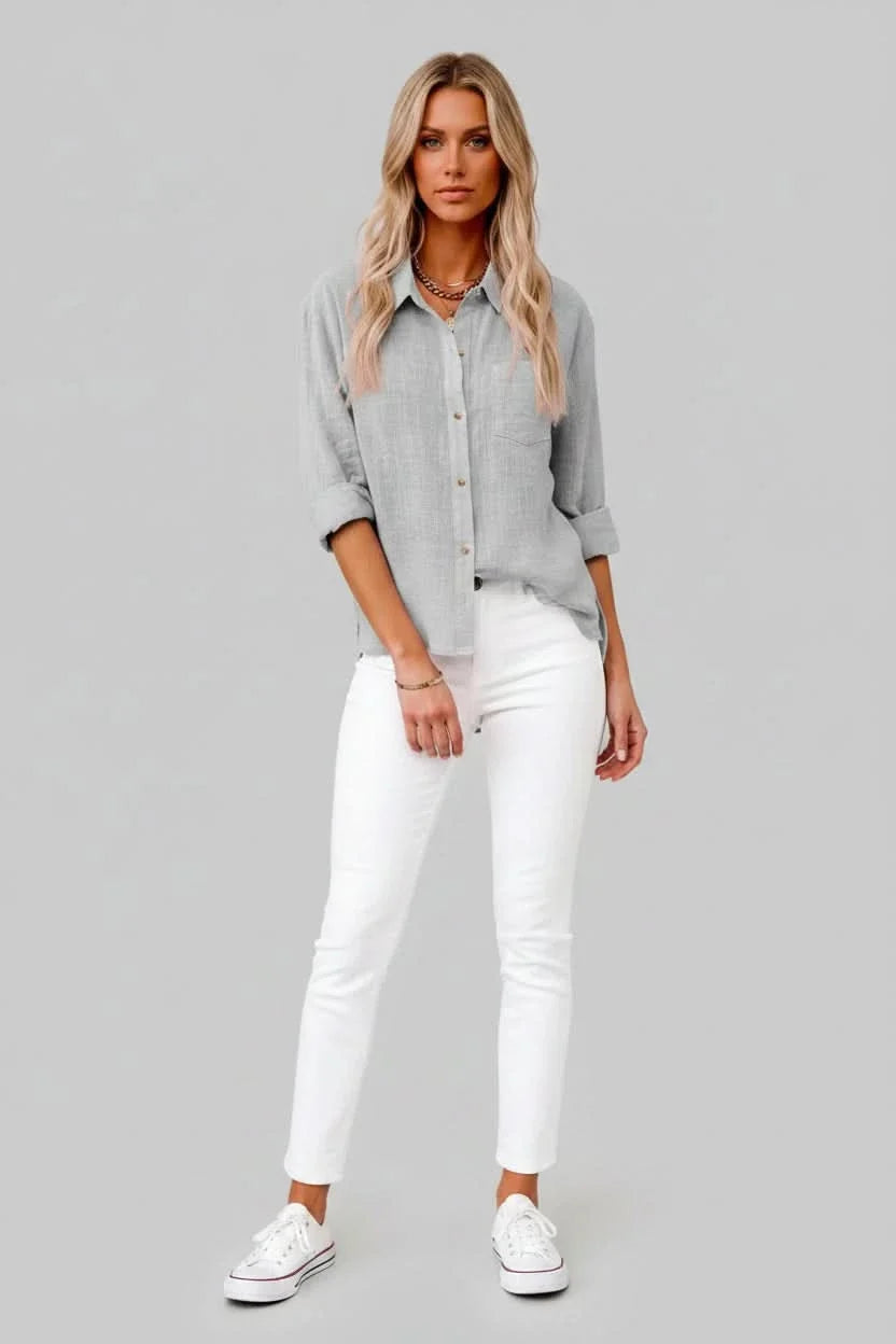 Essential men's lightweight solid button-up shirt. Breathable fabric provides all-day comfort for casual style.