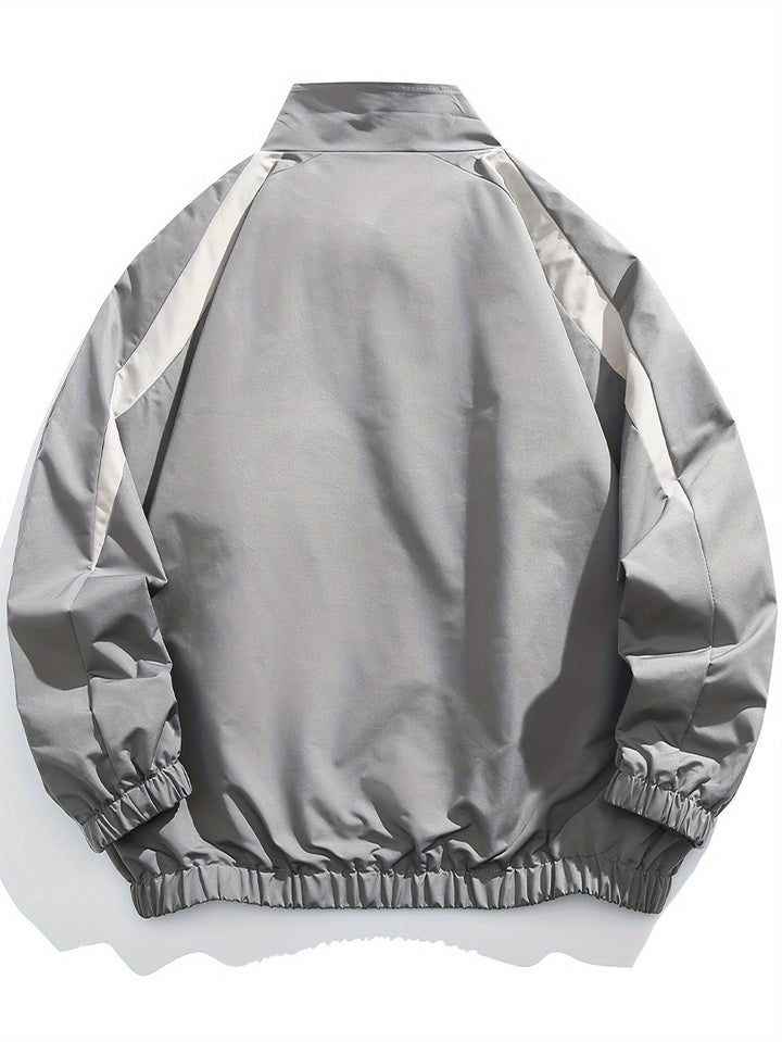 Back view of a men's lightweight windbreaker jacket. Stand collar, great for spring/fall transitions.