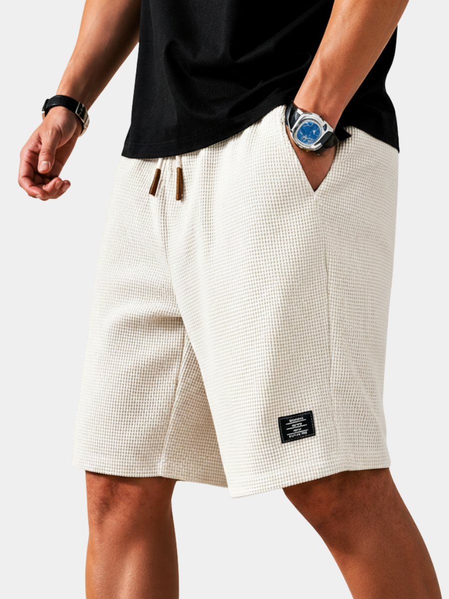 Men's lightweight summer waffle shorts with elastic waist & drawstring for ultimate comfort & casual style.