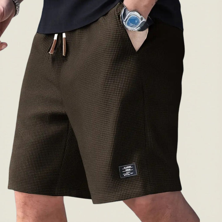 Versatile men's lightweight waffle shorts for summer adventures, casual outings, or home comfort.