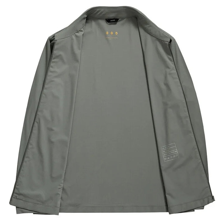 Stylish men's outerwear, a lightweight performance jacket in a versatile color, suitable for all seasons.