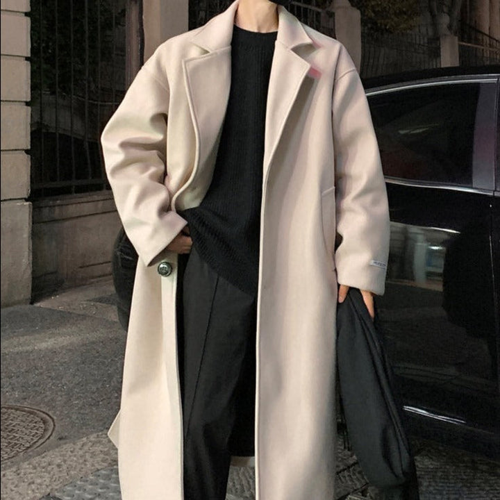Sleek men's long belted overcoat, perfect tailored outerwear for timeless formal or smart casual autumn fashion.