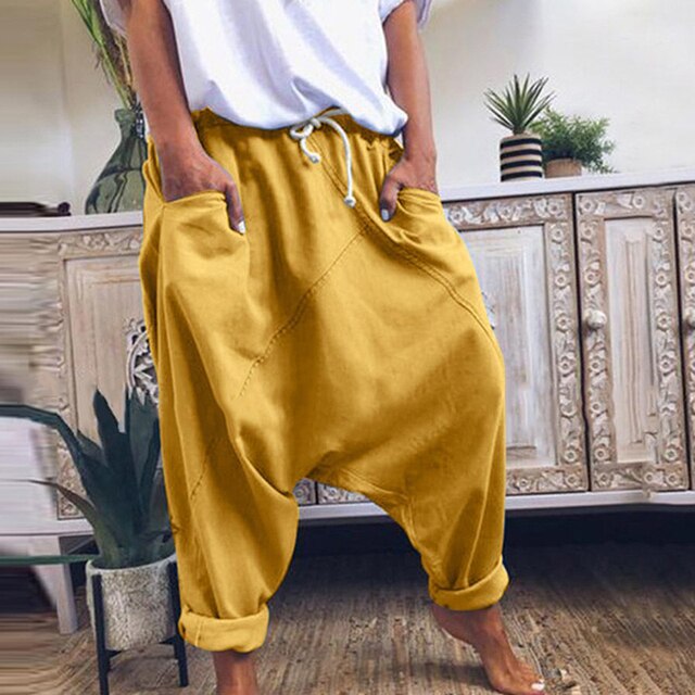 Men's loose-fit bohemian harem pants in yellow for ultimate comfort & relaxed casual style.