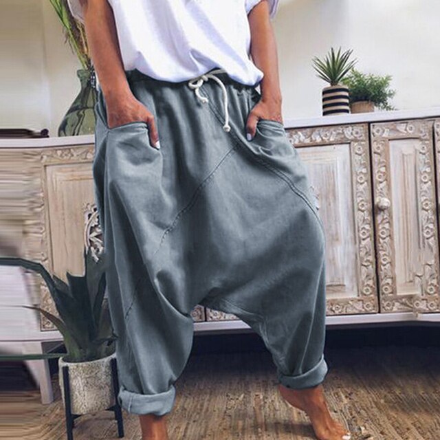 Stylish men's gray bohemian harem pants with wide leg, perfect for comfort & relaxed fashion.