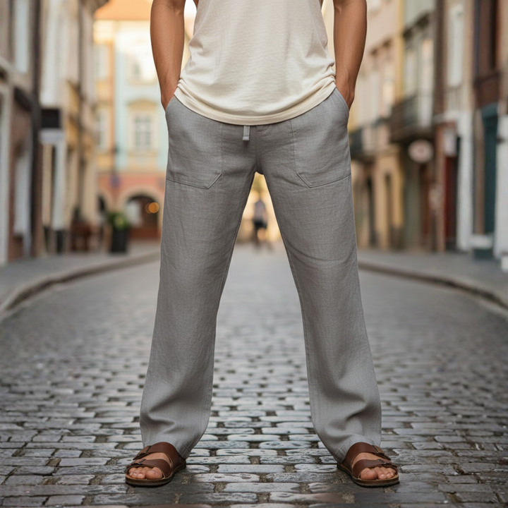 Men's loose fit linen drawstring trousers in a relaxed style. Perfect casual comfort for summer.