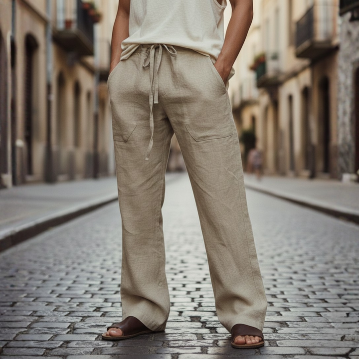 Back view of men's loose fit linen pants, showcasing comfort & casual style. Ideal for summer.