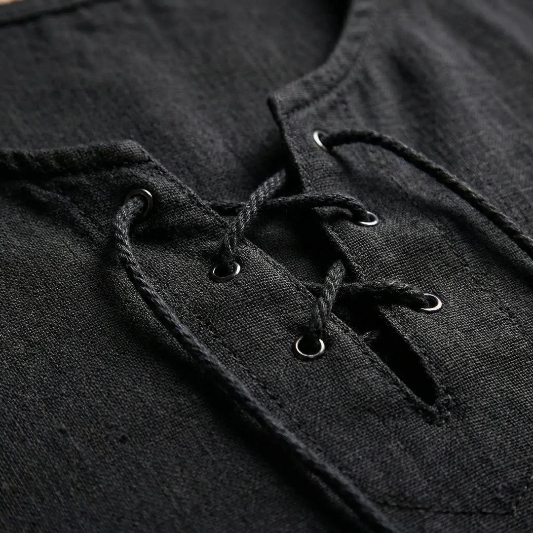 Half-sleeve men's pullover, loose V-neck, and stylish lace-up front. Comfortable summer fashion.