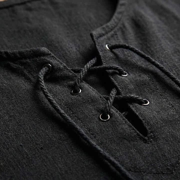 Half-sleeve men's pullover, loose V-neck, and stylish lace-up front. Comfortable summer fashion.