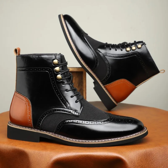 Pair of black leather brogue dress boots for men, featuring classic wingtip design and polished finish.