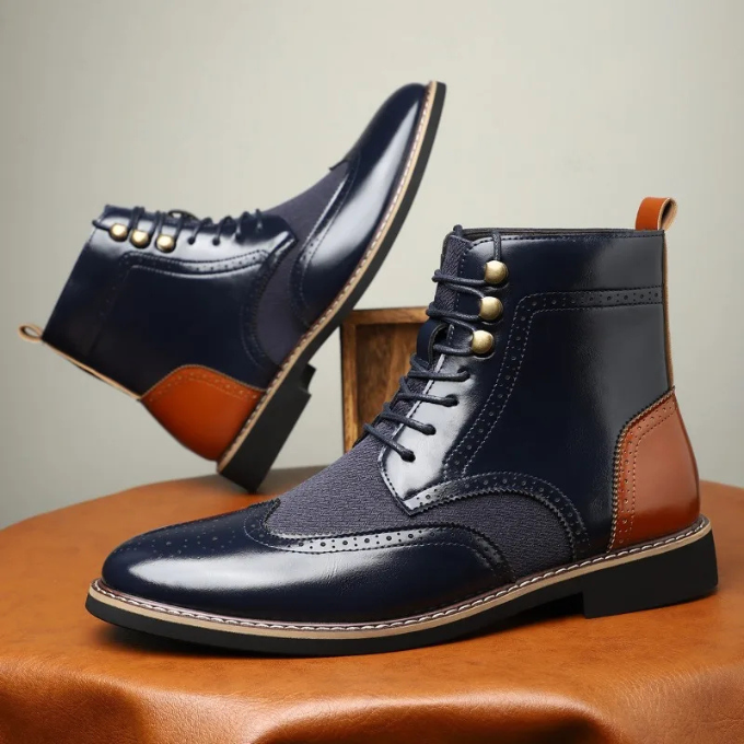 Detail of the lacing and brogue accents on a men's luxurious leather dress boot, ensuring a refined look.