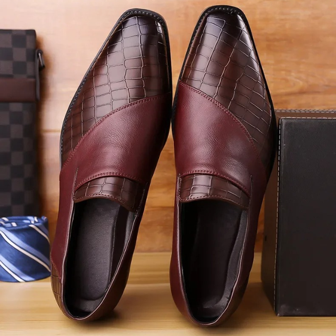 Luxury men's fashion loafer with a distinct croc-texture, versatile for any outing