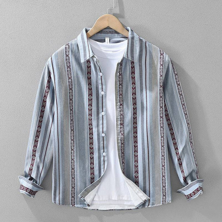Effortless men's Medina striped button-down shirt, perfect for a relaxed summer outing or stylish vacation look.