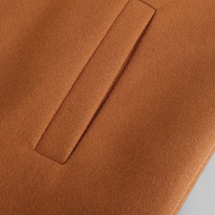 Modern men's smart casual button coat, a sophisticated minimalist outerwear piece for fall/winter fashion.