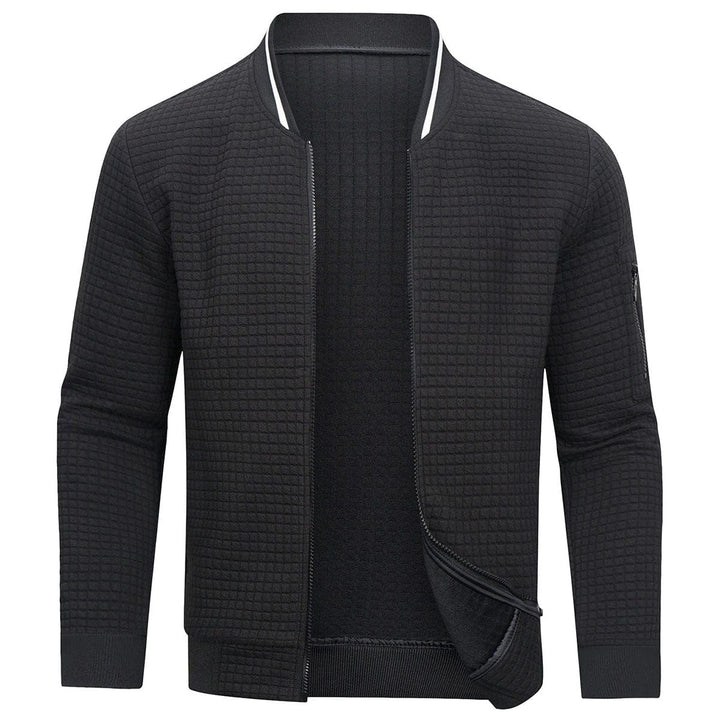 Detailed view of the grid pattern on a men's full-zip textured knit cardigan, showcasing its unique style and quality.
